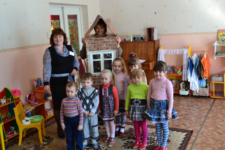 Children are playing an energy saving game at the Zhaludok day care center.