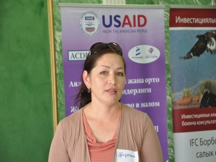 Gulzat Tuleeva presenting her guesthouse during a regional business meeting in May 2015
