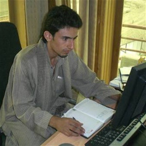 Aimal, a student in the BBA program, conducts research for his marketing class.