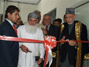 President Hamid Karzai and Minister of Energy and Water Ismail Khan inaugurating the power line from Uzbekistan to Kabul.