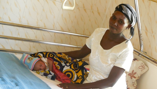 Women and Baby rest in hospital room