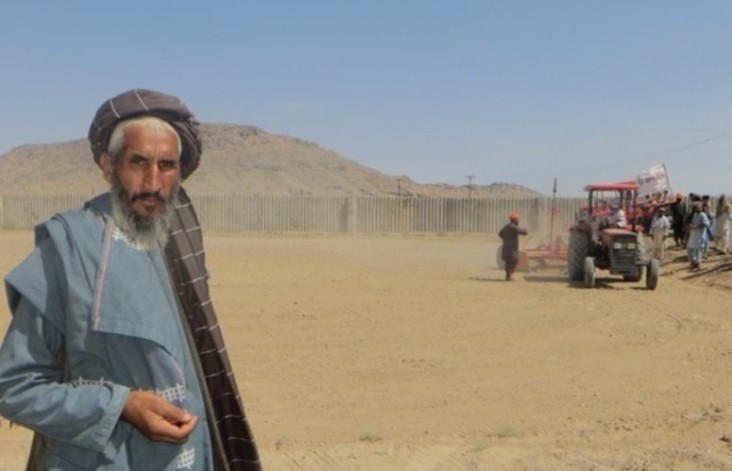 Juma Khan, a farmer in Panjwayi, with his newly bought tractor.