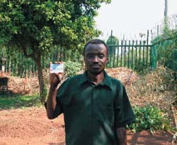 Mr. Mkandawire holding his OIBM smart card.