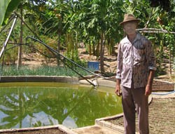 Seu Correa proudly displays his mandala farming system.