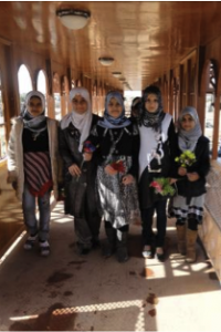 Schoolchildren on pedestrian bridge in Basra, a community project supported by USAID