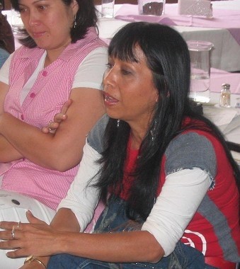 Vilma Dinora Morales, a champion of women's rights in Villa Nueva, attends a domestic violence training session.  