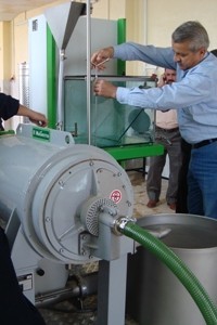 Al-Zaytoon Olive Association members in Ninawa install new olive processing equipment provided by USAID-Inma.