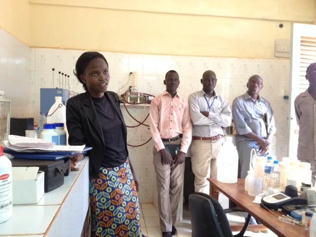 Tivo Abowro Chol describes the water quality testing process of her lab at the Wau Water Corporation.