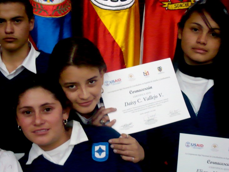 Several youth mediators receive their diploma after USAID-supported conciliator training. 