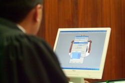A USAID-supported court automation system enables chief judges to generate monthly court statistics.