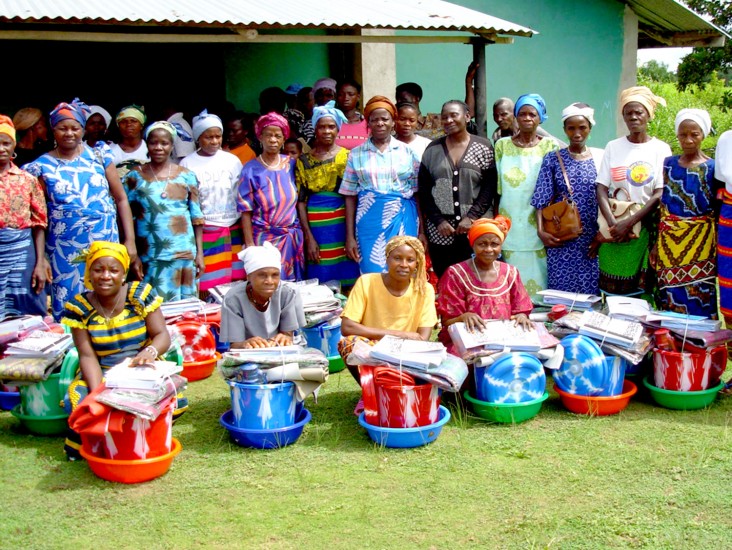 Traditional midwives receive clean delivery kits as they graduate from USAID training in Liberia  