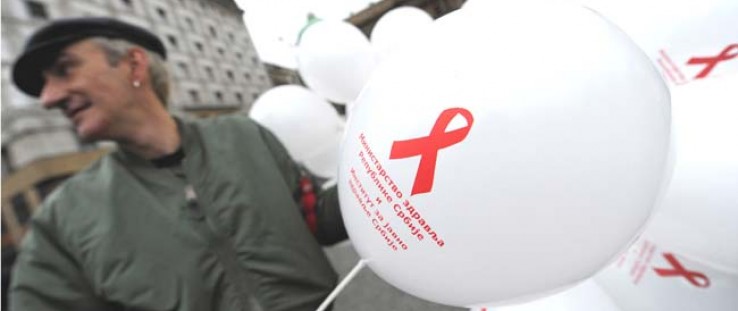 A Serbian activist holds balloons Dec. 1, 2010, during a World AIDS Day rally in the center of Belgrade. At the time, a U.N. exp