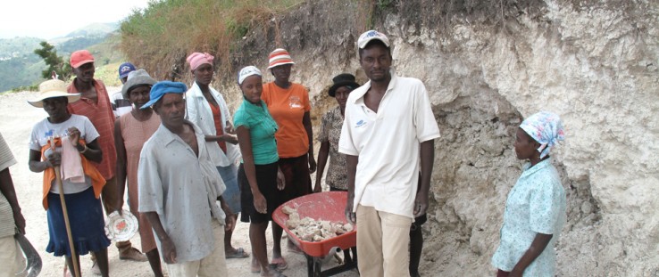 A key constraint to agricultural development in Fond Baptiste, Haiti, is the poor condition of rural roads. Above, members of th