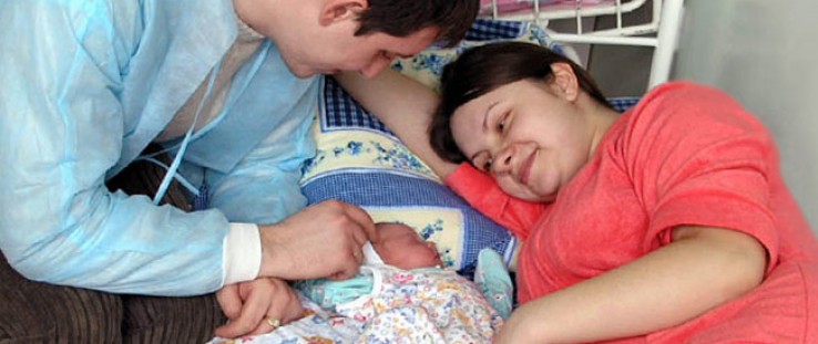 Natalia and Alexei Voinerovsky are enjoying the company of their newborn son in a postpartum ward of the Oblast Hospital