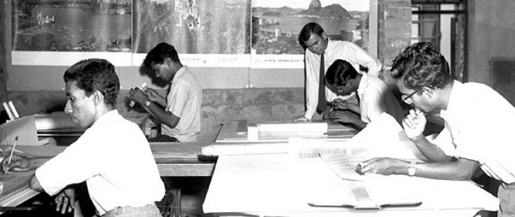 James Walden (standing) works with students in the design studio in 1962.