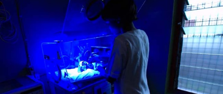 A baby is treated by D-Rev's Brilliance device in a neonatal care intensive unit in Ogbomoso, Nigeria.