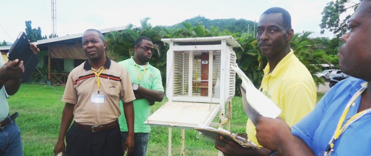 Through training provided by a USAID climate change program, agriculture extension officers learn to interpret weather readings.