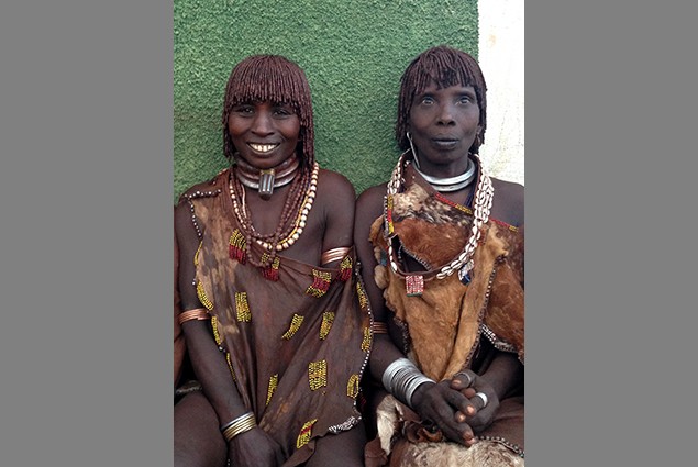 Dobe Oyita and Sayu Elu are members of the Hamar tribe. As females, it’s their job to walk for miles to get water for their fami