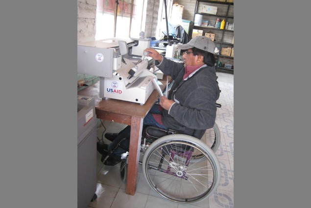 Man with Physical Disabilities Working