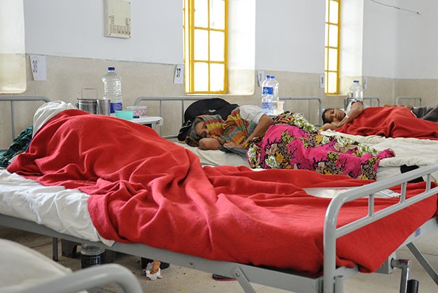 Patients sleep on cots in the Fistula Ward