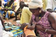 A mother nurses her child in Senegal