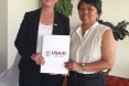 Mission Director presents USAID's letter of support for CARMMA Action Plan