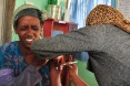 Natsaannat, a health extension worker in Ethiopia, gives an injectable contraceptive to Itenish in Wara Village.