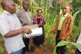 MoAKenya staff discussing CBAMFEW project with a farmer forecaster in Embere N in Kenay