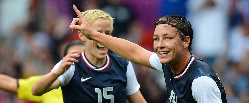 US' forward Abby Wambach (R) celebrates after scoring during the London 2012 Olympic Games. Credit: Andrew Yates / AFP