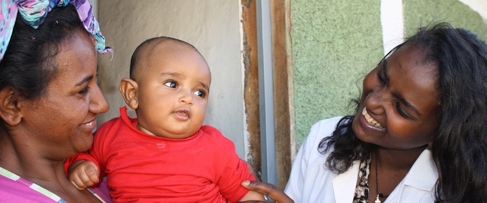 Urban health professional Sister Mahelet visiting a household in Addis Ababa. Photo: Kibrewosen Worku, John Snow, Inc.
