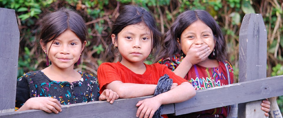 Ixil Mayan girls pose for a photo