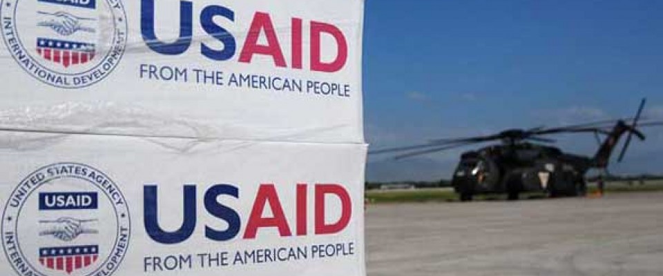 A USAID sponsored relief helicopter delivers supplies. USAID provides assistance to countries all over the globe.