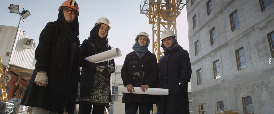 Women working as construction engineers