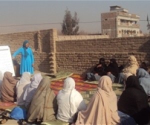 A group of women elders from Qasam Abad village, Behsud District, meet to discuss women's role in dispute resolution and to form