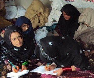 The women of Kahrotai Village are pleased to have the opportunity to take skills and literacy courses.