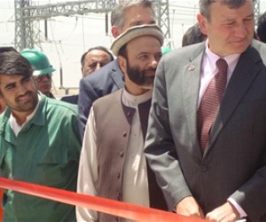 U.S. Ambassador Karl Eikenberry (right) is joined by (right to left) Minister of Economy Abdul Hadi Arghandiwal, USAID Mission D
