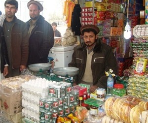 Cartons of eggs stand in the front of Abdul Naser’s market stall in Kishim, Badakhshan Province.
