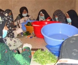 Women from the Saffron Makers Association of Jebrayel prepare pickles for processing.