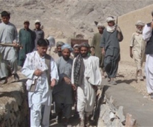 The sub-district manager monitors a project site and meets his constituents in sub-district six of Kandahar Province.