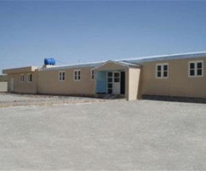 AFTER: Through USAID, the clinic received a major refurbishment and a newly constructed wing. The roof, building exterior, inter