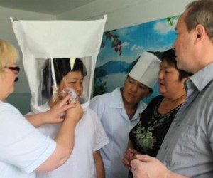 Health care workers learn to use infection control measures in the Kyrgyz Republic.
