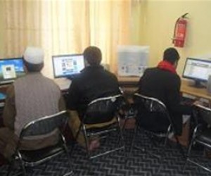 Students at Nangarhar Medical School work in the new computer lab, which was refurbished and equipped with Internet access by a 