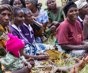 Women gather at a USAID-supported village savings and lending group.
