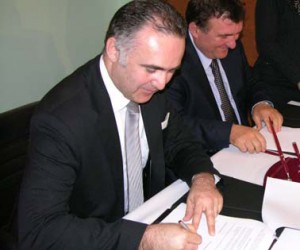Signing the first commercial loan to a local government unit in Albania.