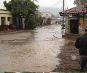 The capital of Honduras, Tegucigalpa, was flooded by Hurricane Mitch in October 1998.