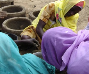 Women make fuel-efficient stoves in Mukjar camp in West Darfur.