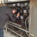 Man helping to detect illegal activity on a meter box
