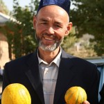 Image of Makhadali Khuramov displaying his fruit.