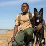 Game ranger Peter Tembo with his partner, Lego. Part of the USAID-funded Canine Detection Team fighting wildlife trafficking in Zambia’s Lower Zambezi National Park. Photo courtesy of Conservation Lower Zambezi.