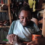 Melesse Yohannes uses his “Rough Rider” wheelchair to go out and buy supplies for his shoe-making and repair shop.